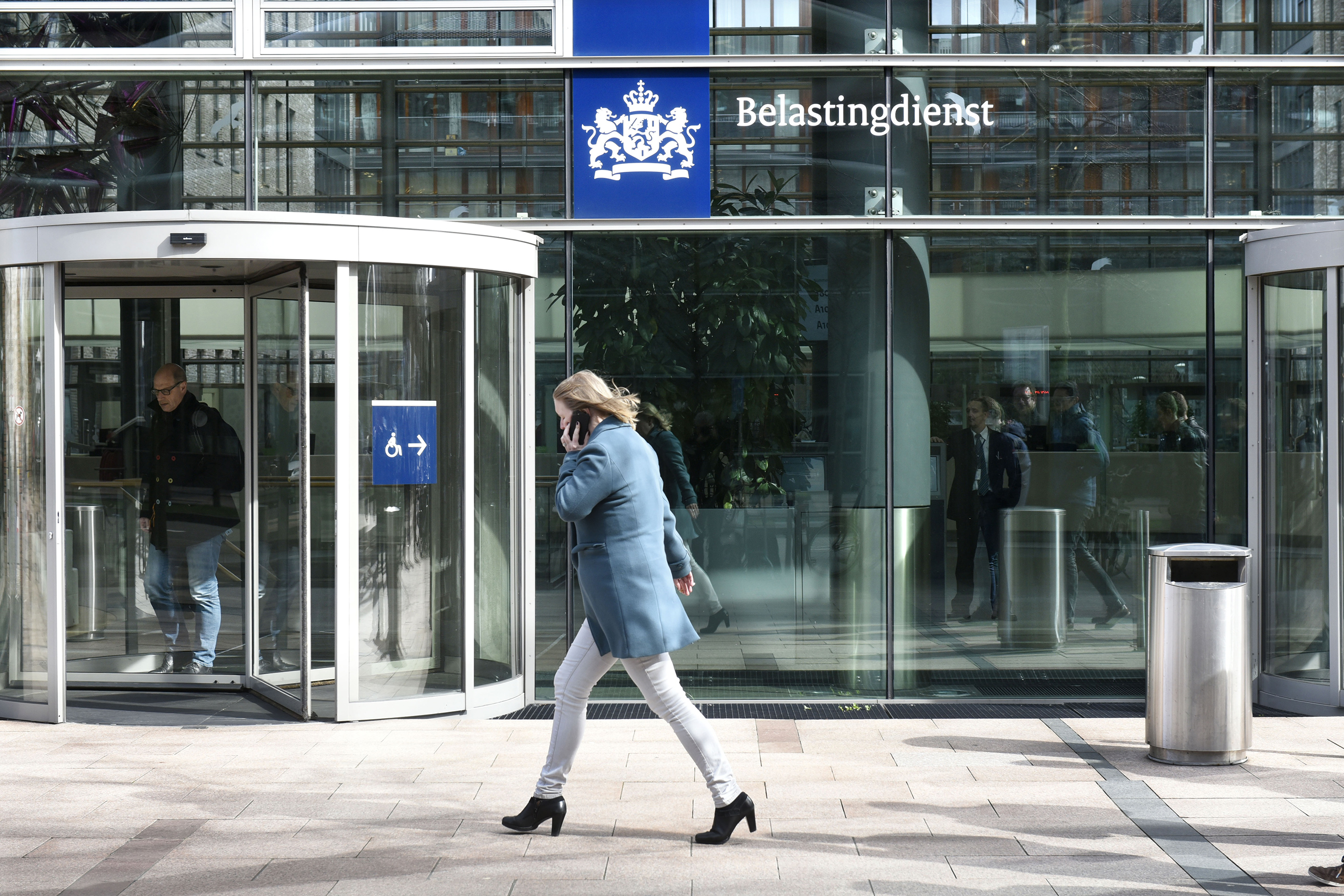 studio dumbar design visual brand identity for Rijksoverheid The Dutch Government the visual identity that integrates all 175 Dutch government organisations exterior signage Belastingdienst